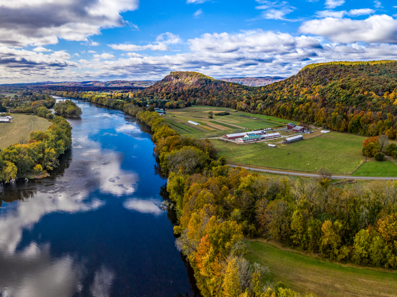 wide angle view of Idaho farm with water