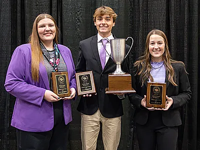 Kansas State took first place in the both the Kansas City and Chicago Collegiate Crops Contests in 2025. From left to right: Ella Pachta, Collin Mills, and Karlie Albright.