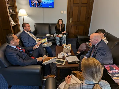 Society members meet with staff from the office of U.S. Rep. Eugene Vindman.