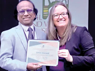 Dr. Girish Kumar Panicker receives the 2023 Conservation Research Award from the Soil and Water Conservation Society.